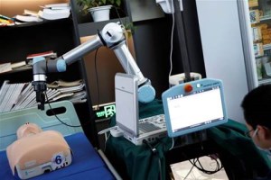 China develops new robotic arm to protect coronavirus doctors article image