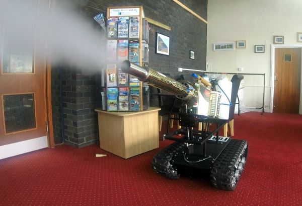 Forth's disinfecting robot being demonstrated in a reception area at Whitehaven Civic Hall-min